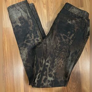 Reversible animal print jeans. Reverse side is  army green. Size is 10.